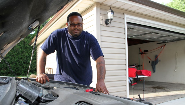 John Barbosa working on his car